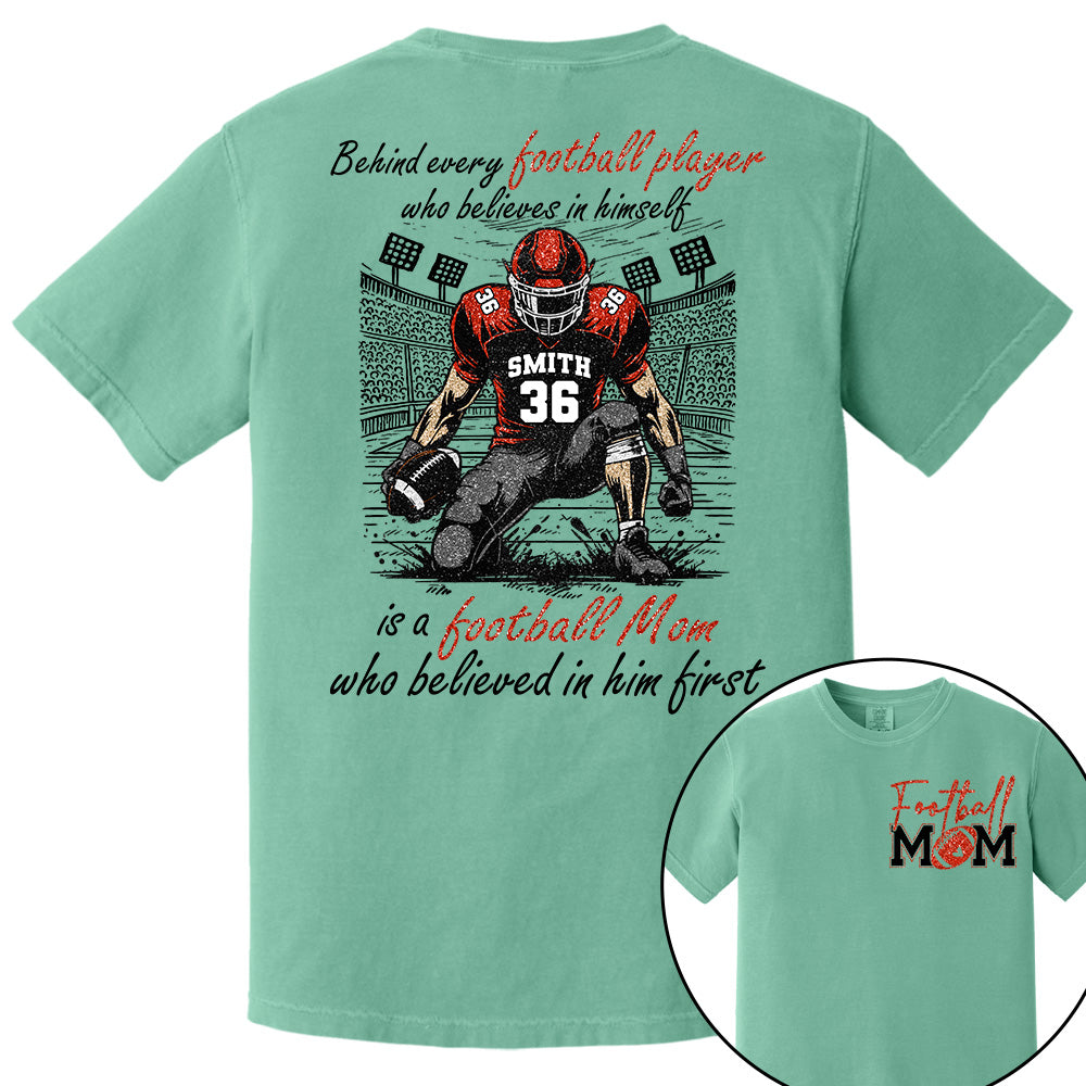 Behind Every Football Player Who Believes In Himself Is A Football Mom Who Believed In Him First, Football Mom Tshirt -TD22
