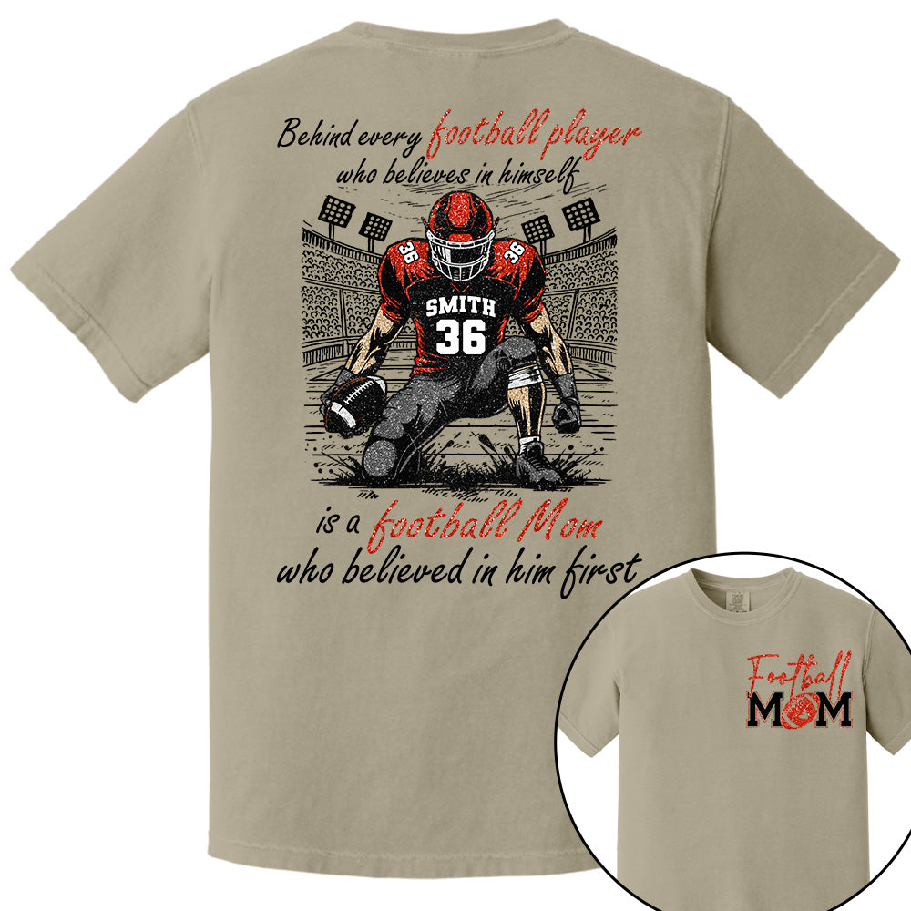 Behind Every Football Player Who Believes In Himself Is A Football Mom Who Believed In Him First, Football Mom Tshirt -TD22