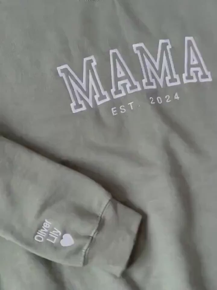 Load video: Personalized Mama Embroidered Sweatshirt With Kid Names On Sleeve, Mothers Day Gift, Birthday Gift For Mom, New Mom Gift