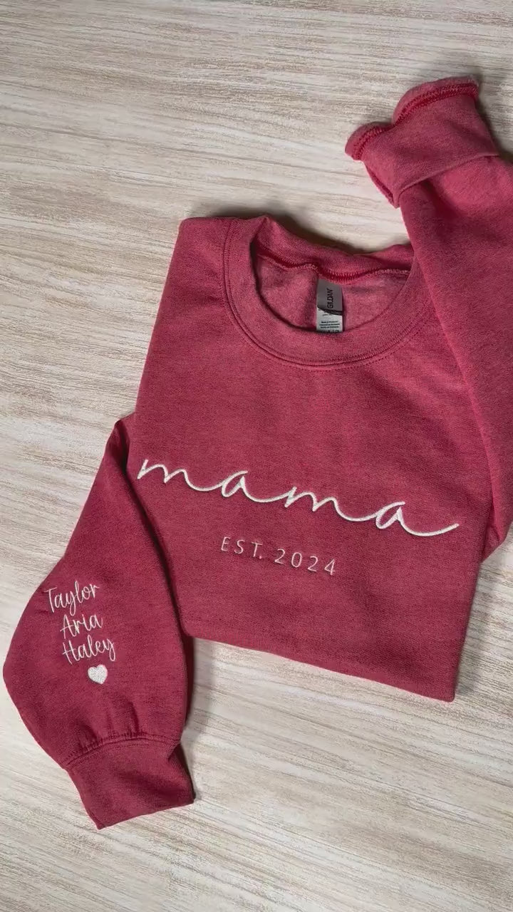 Load video: Custom Mama Embroidered Sweatshirt, Personalized Mom Sweatshirt With Kids Names Sleeve, Pregnancy Reveal Outfit, Birthday Gift, Mothers Day Gift