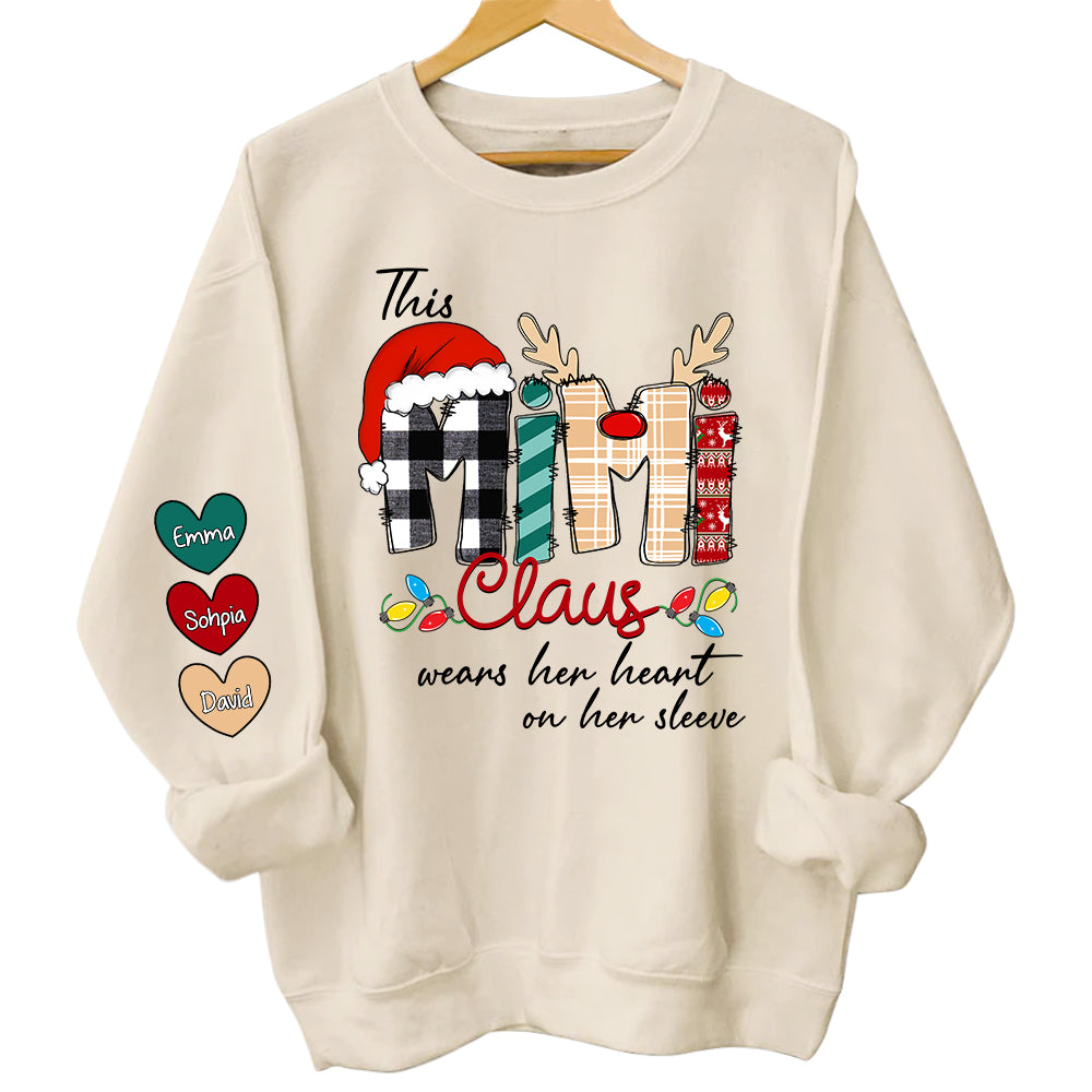 This Mimi Claus Wears Her Heart On Her Sleeve - Personalized Grandma With Grandkids Name Shirt